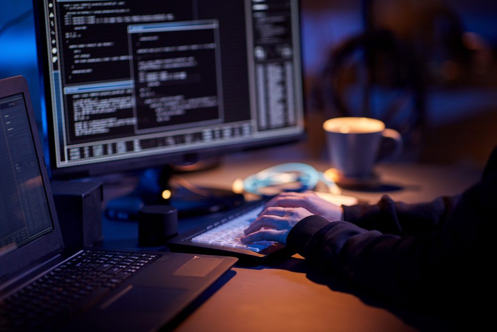 cybercrimehackingandtechnologyconcept-closeupofhacker